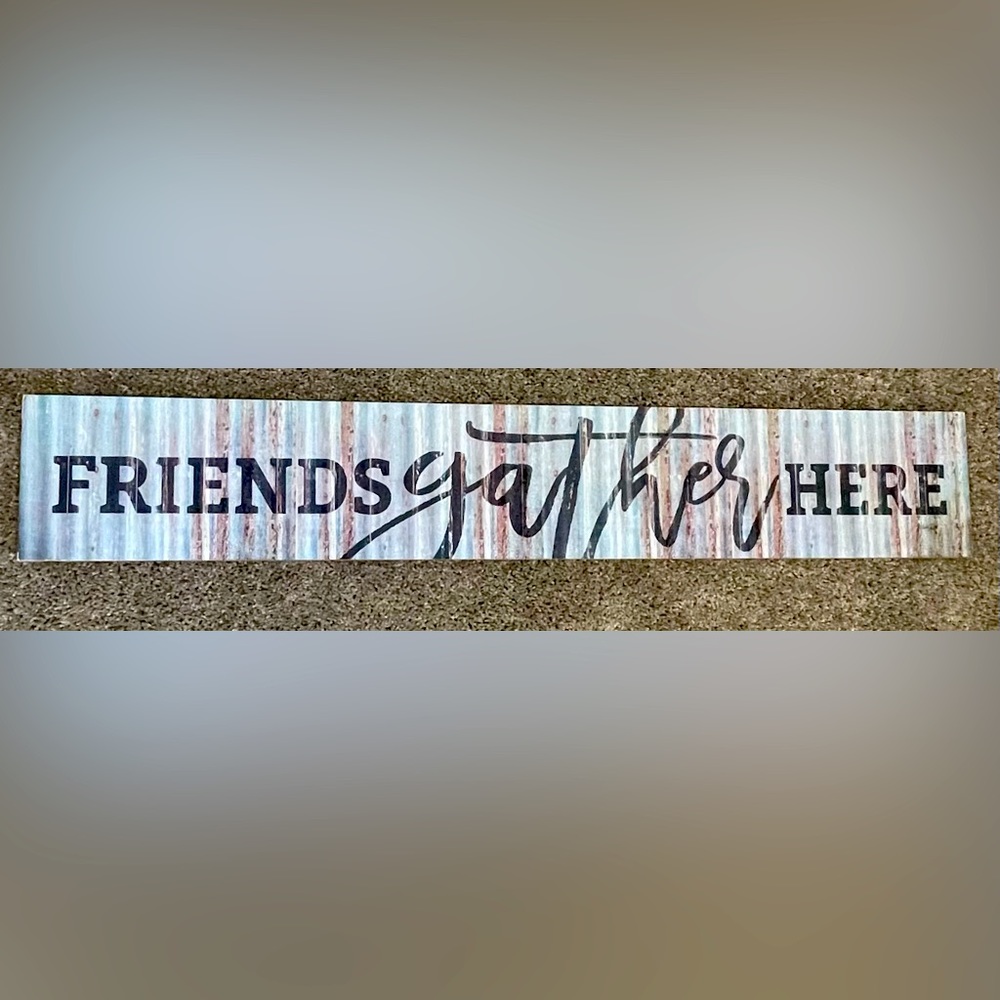 Wood sign with blue, white, brown finish, and black lettering